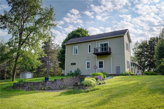 1544 Paddy Ln, Macedon, NY 14502 - rear view of property featuring a shed, a balcony, and a yard