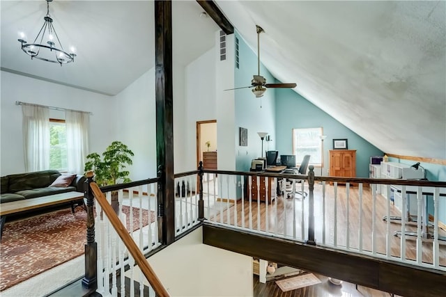 1544 Paddy Ln, Macedon, NY 14502 - interior space featuring a chandelier, a desk, a ceiling fan, high vaulted ceiling, and wood finished floors