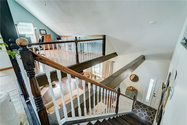 1544 Paddy Ln, Macedon, NY 14502 - stairway featuring lofted ceiling and baseboards