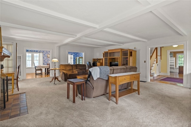 960 Landing Rd N, Brighton, NY 14625 - living area with carpet flooring, plenty of natural light, stairs, and beamed ceiling