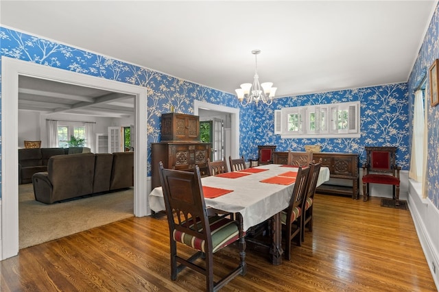 960 Landing Rd N, Brighton, NY 14625 - dining area featuring wallpapered walls, a chandelier, and wood finished floors