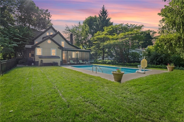 960 Landing Rd N, Brighton, NY 14625 - swimming pool featuring a sunroom, a fenced backyard, and a patio
