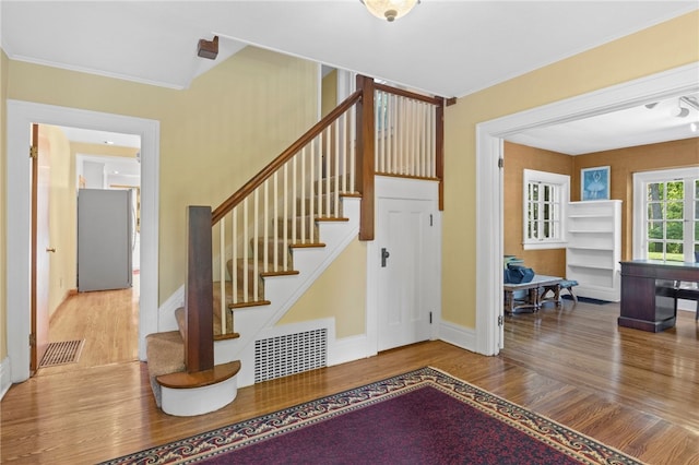 960 Landing Rd N, Brighton, NY 14625 - staircase featuring wood finished floors and crown molding