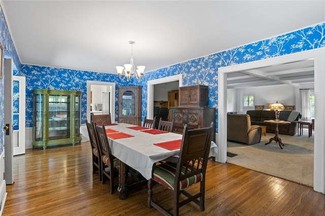 960 Landing Rd N, Brighton, NY 14625 - dining area with wallpapered walls, a chandelier, and wood finished floors