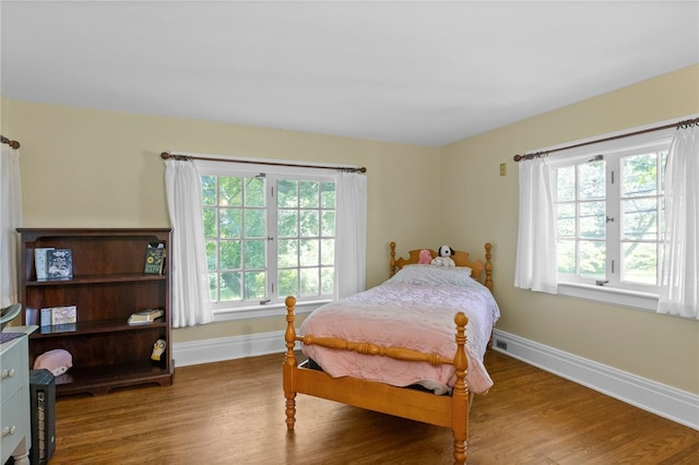960 Landing Rd N, Brighton, NY 14625 - bedroom featuring wood finished floors and baseboards