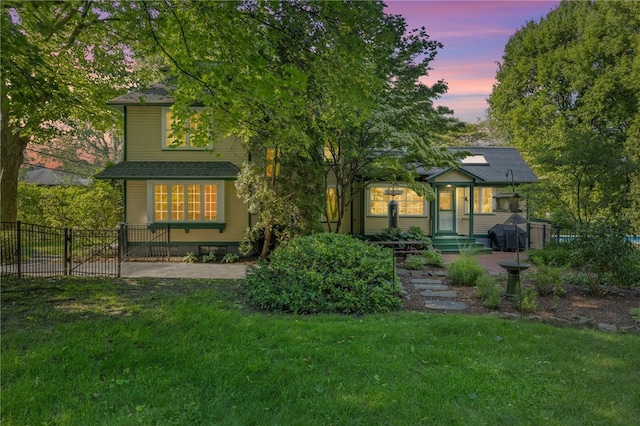 960 Landing Rd N, Brighton, NY 14625 - back of house at dusk featuring a gate
