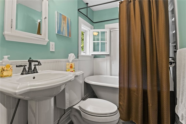 960 Landing Rd N, Brighton, NY 14625 - full bathroom featuring a wainscoted wall and a soaking tub