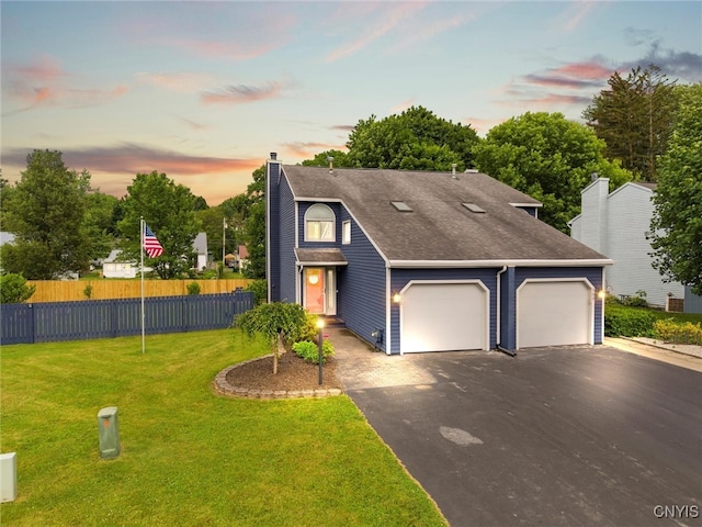 101 Post Lamp Cir, Cicero, NY 13212 - view of front of house with asphalt driveway, a garage, a chimney, and roof with shingles