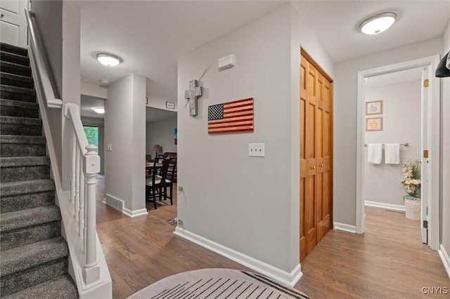 101 Post Lamp Cir, Cicero, NY 13212 - entryway featuring wood finished floors and stairs