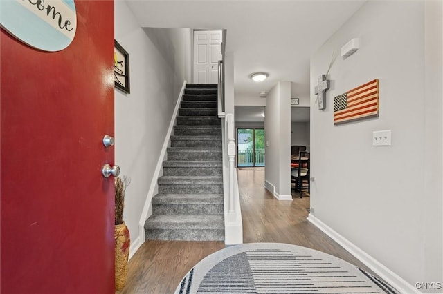 101 Post Lamp Cir, Cicero, NY 13212 - stairway with baseboards and wood finished floors