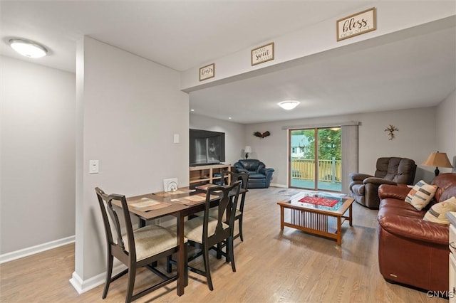 101 Post Lamp Cir, Cicero, NY 13212 - dining room featuring light wood-type flooring and baseboards
