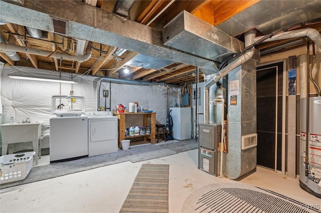 101 Post Lamp Cir, Cicero, NY 13212 - unfinished below grade area featuring independent washer and dryer, gas water heater, and heating unit