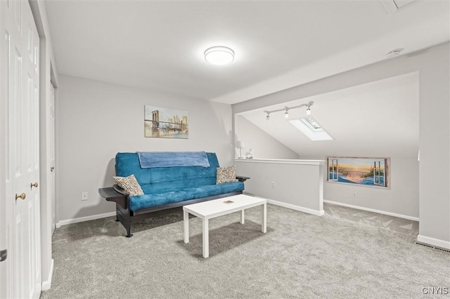 101 Post Lamp Cir, Cicero, NY 13212 - living area featuring carpet flooring, vaulted ceiling, a skylight, and an upstairs landing
