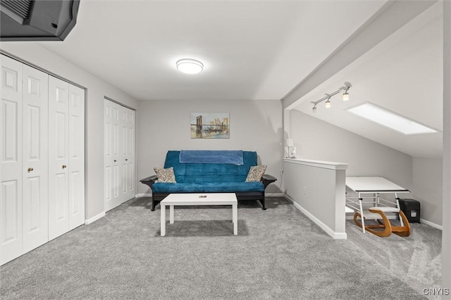 101 Post Lamp Cir, Cicero, NY 13212 - living area with carpet floors, a skylight, and vaulted ceiling