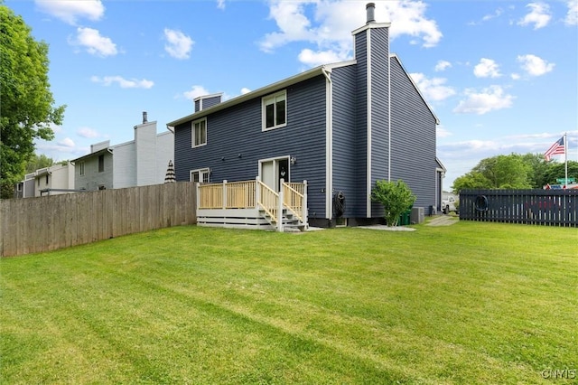 101 Post Lamp Cir, Cicero, NY 13212 - back of property with a chimney and a wooden deck