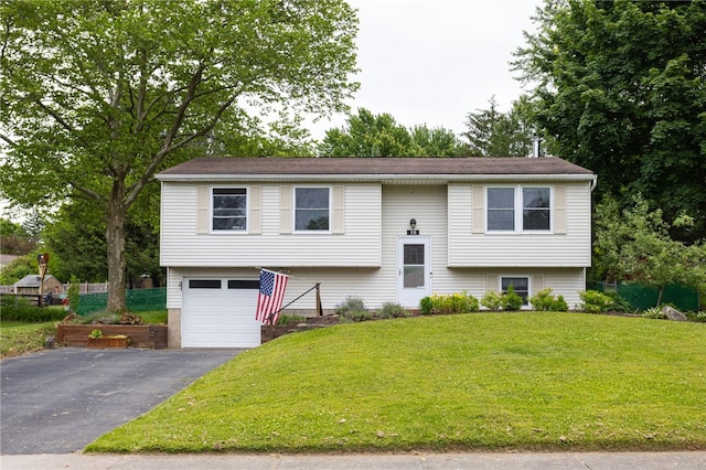 12 Rawhide Dr, Henrietta, NY 14586 - bi-level home with asphalt driveway and a garage