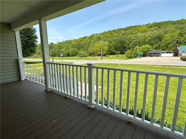 540 Derrick Rd, Foster-Town, PA 16701 - porch featuring a forest view and a yard
