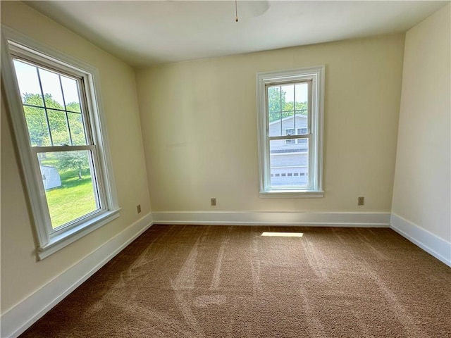 540 Derrick Rd, Foster-Town, PA 16701 - unfurnished room with healthy amount of natural light and dark colored carpet