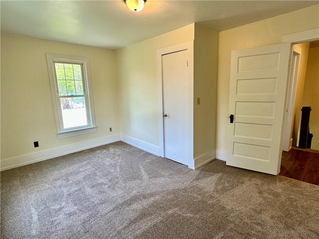 540 Derrick Rd, Foster-Town, PA 16701 - unfurnished bedroom featuring dark colored carpet and baseboards