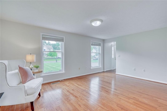 731 Brookeville Dr, Webster, NY 14580 - sitting room featuring light wood finished floors and baseboards