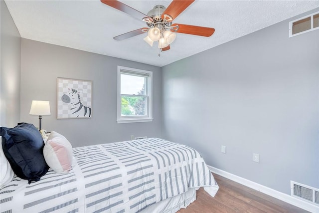 731 Brookeville Dr, Webster, NY 14580 - bedroom with wood finished floors and a ceiling fan