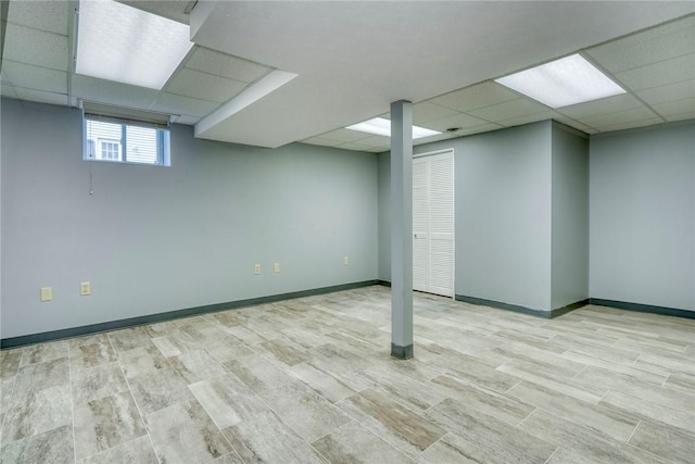 731 Brookeville Dr, Webster, NY 14580 - below grade area featuring a drop ceiling and wood finished floors