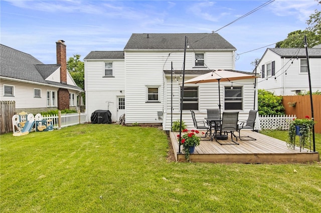 144 Montclair Dr, Irondequoit, NY 14617 - back of house featuring a wooden deck, a fenced backyard, and outdoor dining space