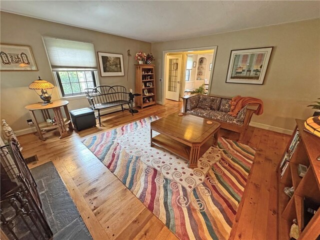 283 Bonnie Brae Ave, Brighton, NY 14618 - living area with wood finished floors and baseboards