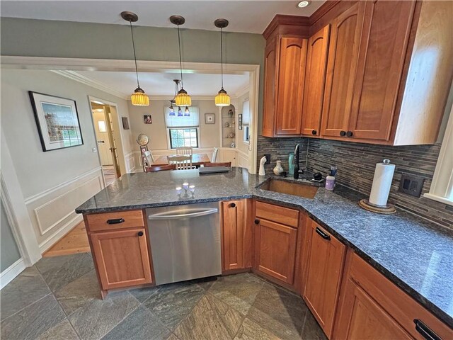 283 Bonnie Brae Ave, Brighton, NY 14618 - kitchen with stainless steel dishwasher, a peninsula, ornamental molding, brown cabinets, and tasteful backsplash