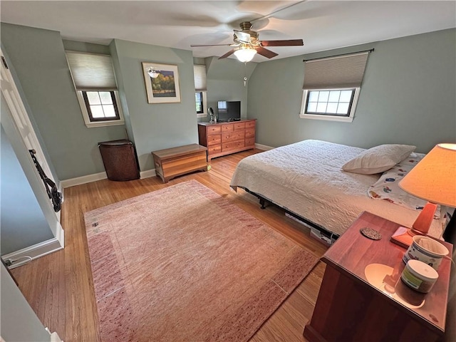 283 Bonnie Brae Ave, Brighton, NY 14618 - bedroom with multiple windows, light wood-style floors, and ceiling fan