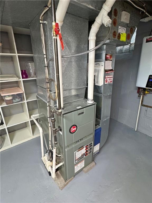 283 Bonnie Brae Ave, Brighton, NY 14618 - utility room featuring water heater