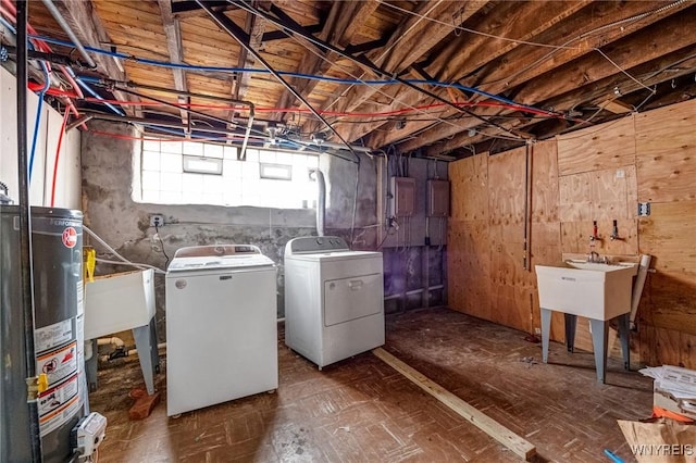 1083 E Lovejoy St, Buffalo, NY 14206 - below grade area featuring gas water heater and separate washer and dryer