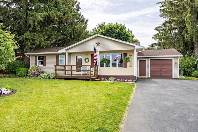 289 W Ave, Sweden, NY 14420 - single story home featuring an attached garage, driveway, a front lawn, and a deck