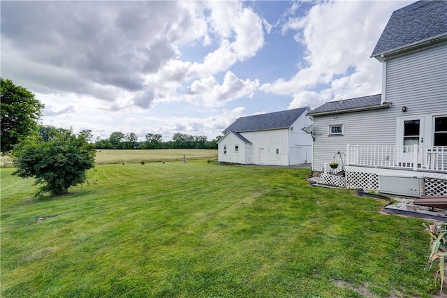 4618 Oak Orchard Rd, Barre, NY 14411 - view of green lawn featuring a deck and an outdoor structure