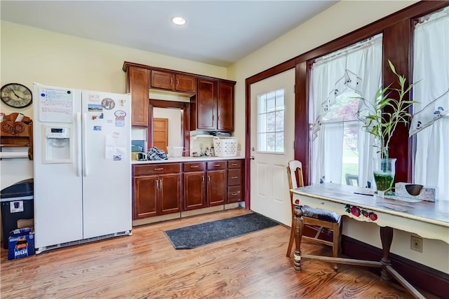 4618 Oak Orchard Rd, Barre, NY 14411 - kitchen featuring white fridge with ice dispenser, light countertops, light wood-type flooring, and recessed lighting