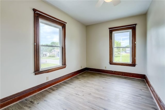 4618 Oak Orchard Rd, Barre, NY 14411 - spare room featuring wood finished floors and ceiling fan