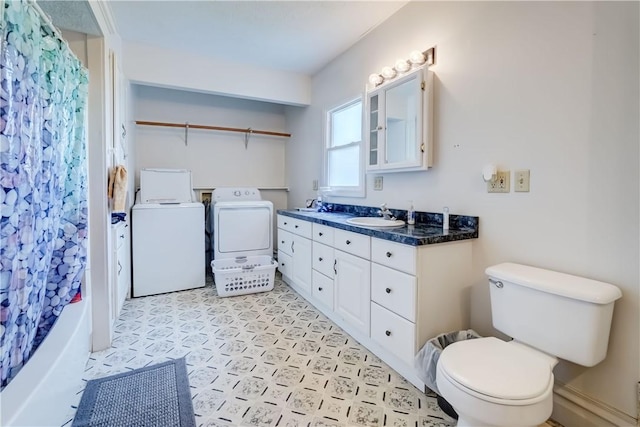 4618 Oak Orchard Rd, Barre, NY 14411 - bathroom with washing machine and clothes dryer, tile patterned floors, double vanity, and shower / tub combo with curtain