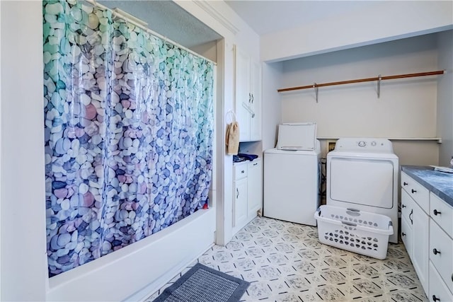 4618 Oak Orchard Rd, Barre, NY 14411 - washroom with washing machine and clothes dryer, cabinet space, and light floors