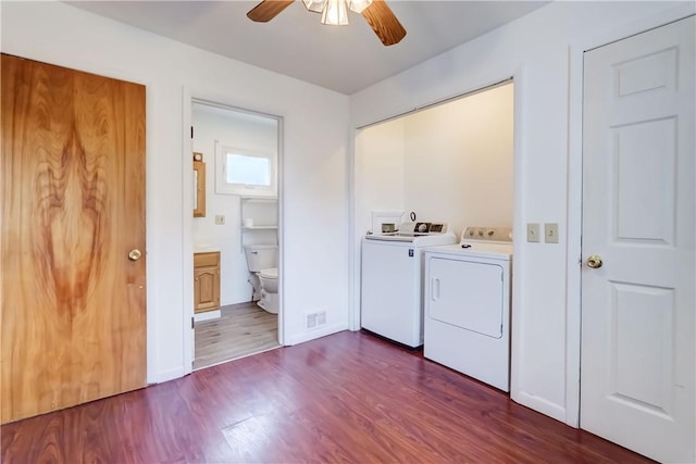 4618 Oak Orchard Rd, Barre, NY 14411 - washroom featuring separate washer and dryer, a ceiling fan, and dark wood-style flooring