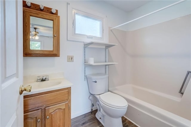 4618 Oak Orchard Rd, Barre, NY 14411 - bathroom with vanity, bathtub / shower combination, and wood finished floors