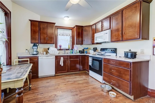 4618 Oak Orchard Rd, Barre, NY 14411 - kitchen featuring white appliances, a ceiling fan, light countertops, and light wood-style floors