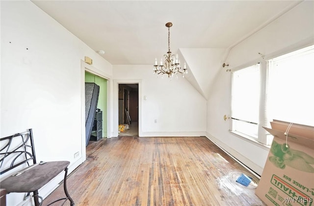 443 Madison St, Buffalo, NY 14212 - unfurnished dining area featuring a chandelier and light wood finished floors