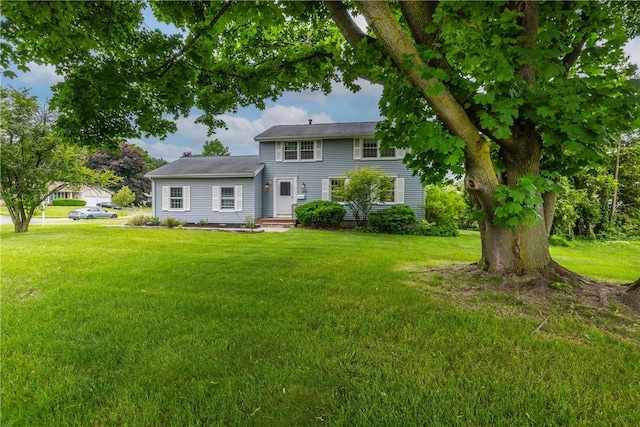 170 Kings S, Irondequoit, NY 14617 - rear view of house featuring a yard