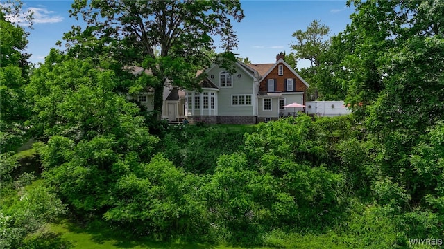 2565 Bowen Rd, Elma, NY 14059 - rear view of property featuring a chimney