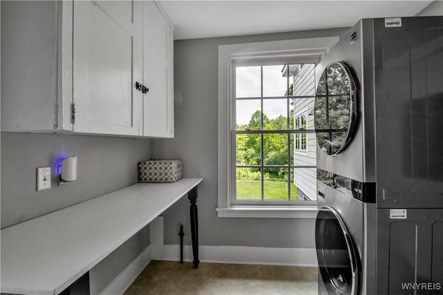 2565 Bowen Rd, Elma, NY 14059 - laundry room with estacked washer and dryer and cabinet space