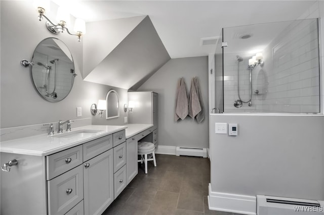 2565 Bowen Rd, Elma, NY 14059 - bathroom with a baseboard heating unit, a baseboard radiator, tiled shower, vanity, and lofted ceiling