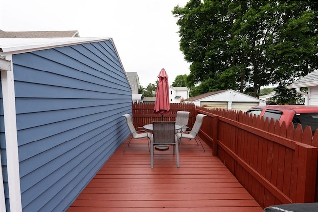 11 Fulton St, North Dansville, NY 14437 - wooden terrace featuring outdoor dining space