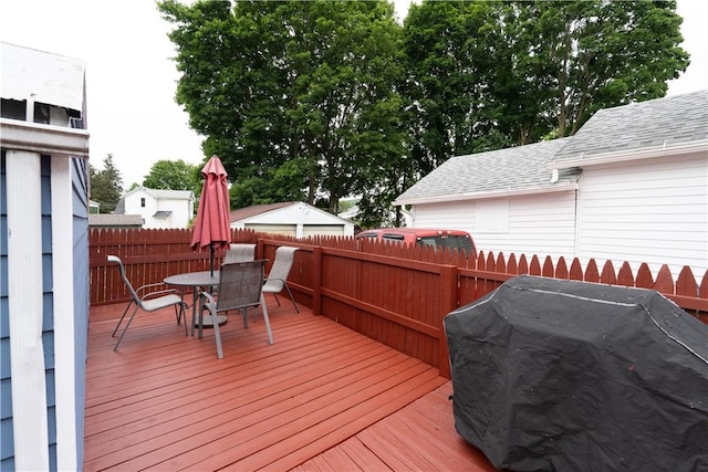 11 Fulton St, North Dansville, NY 14437 - deck with grilling area and outdoor dining area