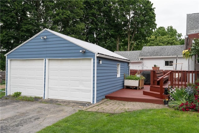 11 Fulton St, North Dansville, NY 14437 - detached garage with view of scattered trees