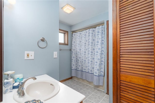 11 Fulton St, North Dansville, NY 14437 - bathroom featuring vanity and a shower with shower curtain